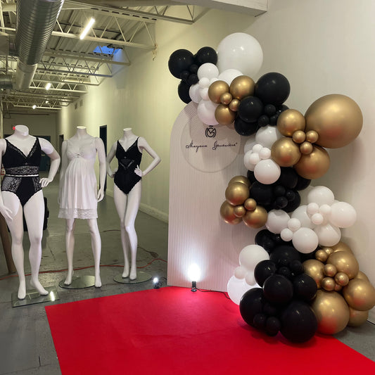 RIPPLED ARCHED BACKDROP AND GARLAND STARTING $675