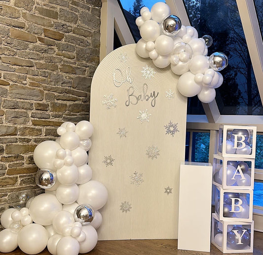 RIPPLED ARCHED BACKDROP, GARLAND AND PLINTH PACKAGE STARTING $650