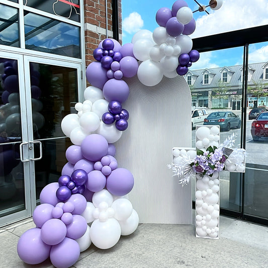 RIPPLED ARCHED BACKDROP AND GARLAND STARTING $675