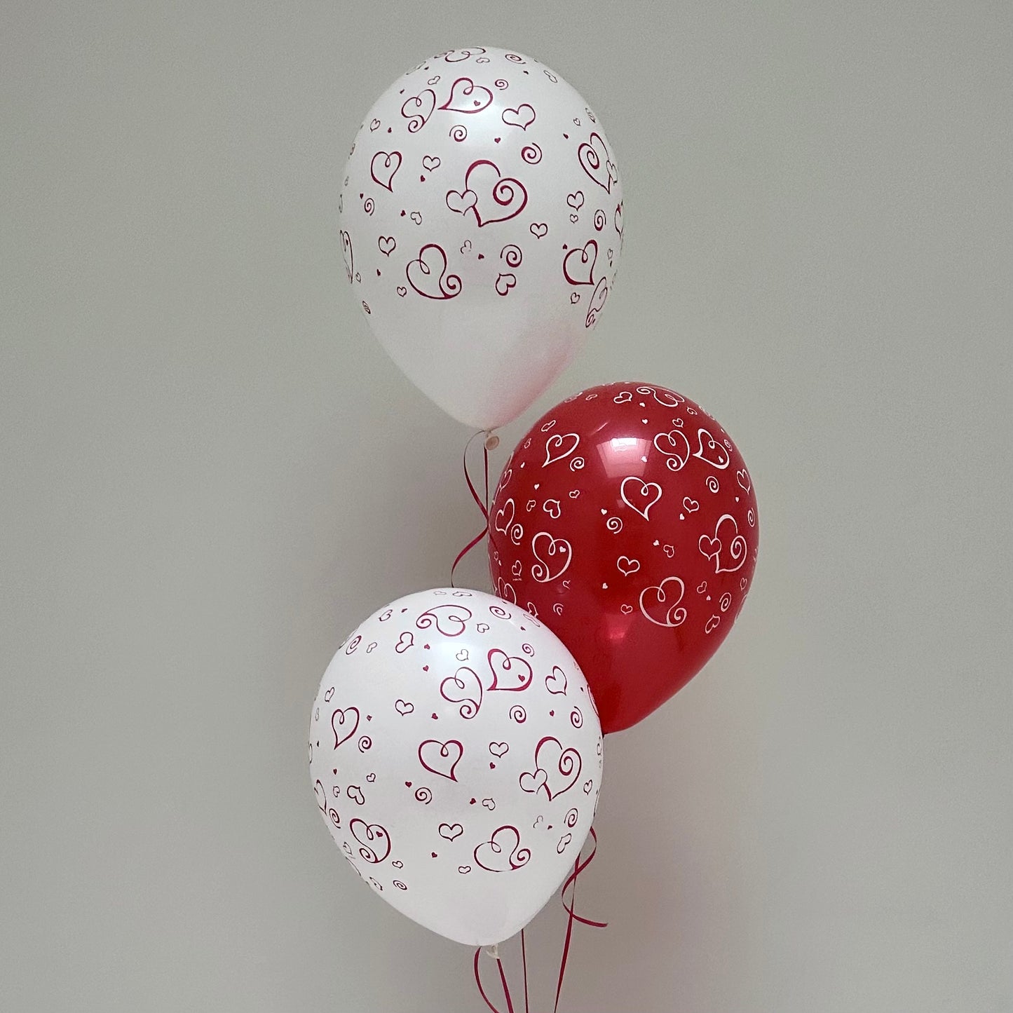 3 WHITE AND RED HEIULM BALLOONS