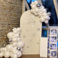 RIPPLED ARCHED BACKDROP, GARLAND AND PLINTH PACKAGE STARTING $650